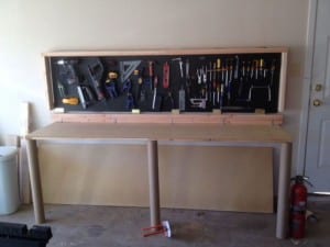 A DIY Wall-Mounted Folding Workbench For A Great DIYer