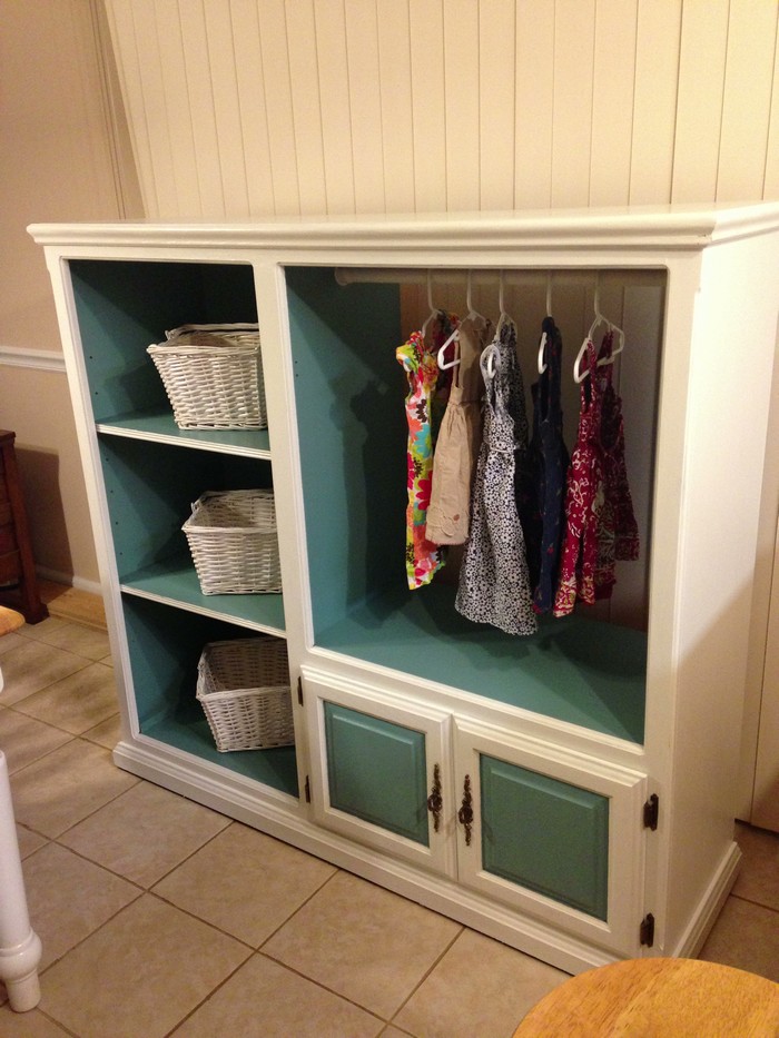 Old entertainment center turned kids armoire