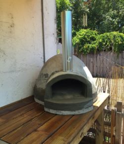 Learn how to build a pizza oven with an exercise ball 