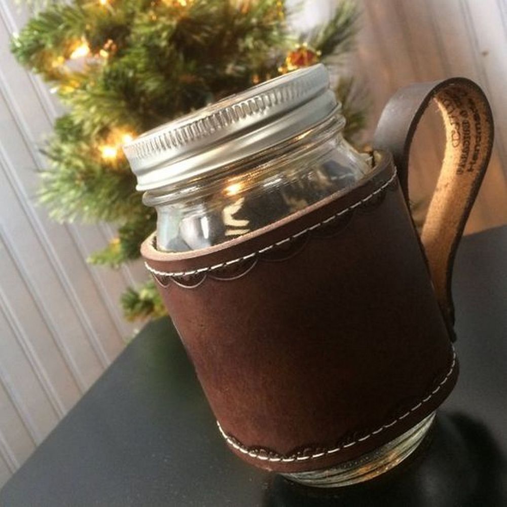 Bored of the old mason jar? Give it a facelift with a leather sleeve and handle!