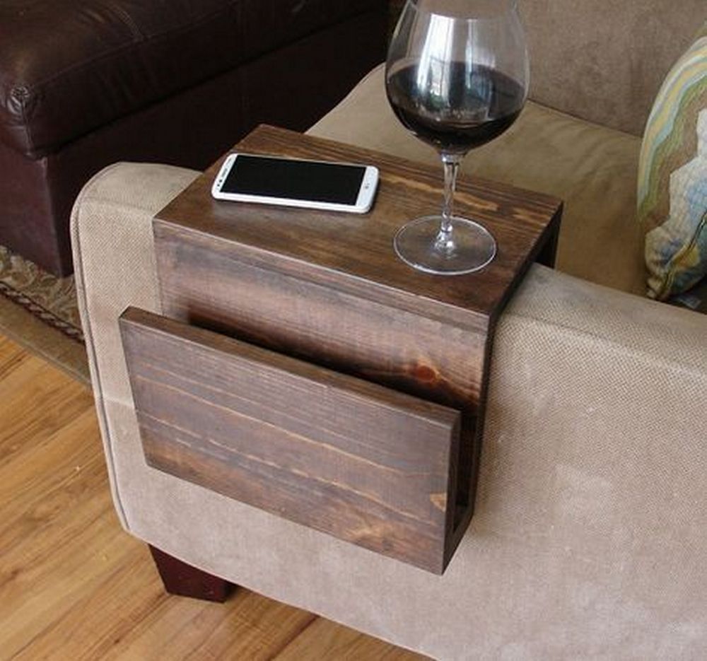 This sofa arm tray can hold food, drinks, and even your cellphone!