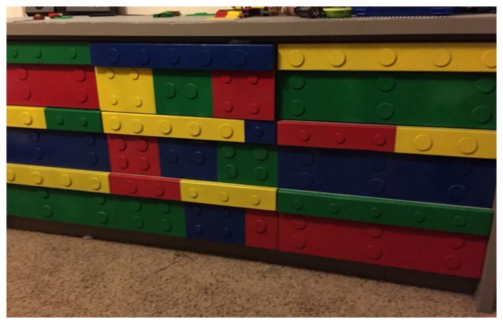 Lego mini figure storage on the side of a dresser- wood, spray paint, Legos  and hot glue! Easy project!