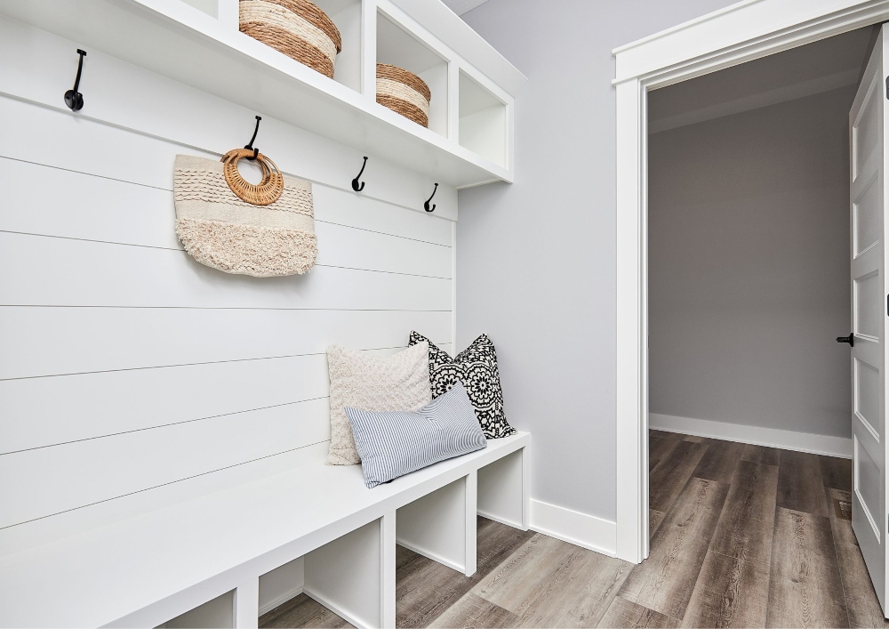 Offering designated storage for outdoor gear, shoes, and accessories, a mud room promotes organization.